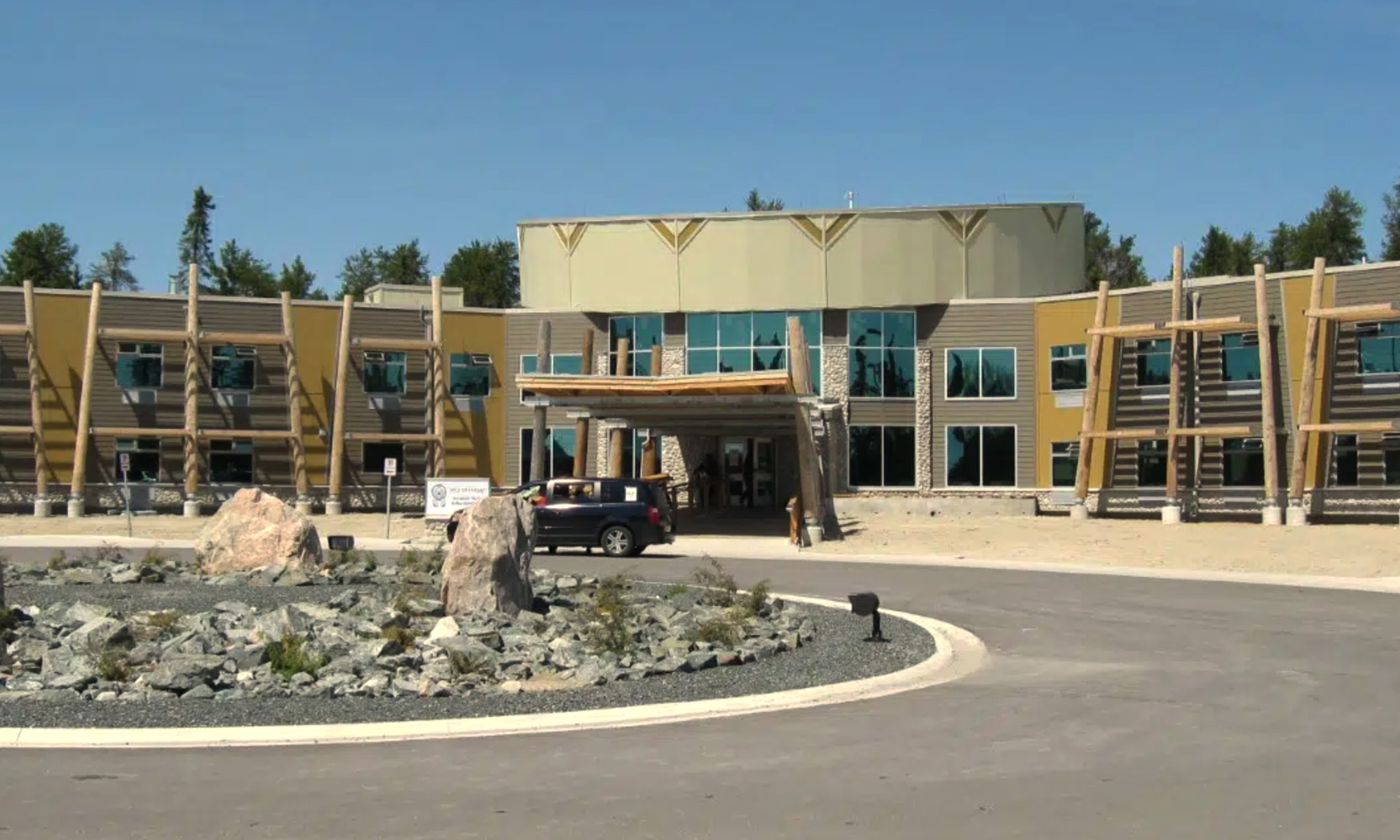 Hostel Exterior featuring milled logs
