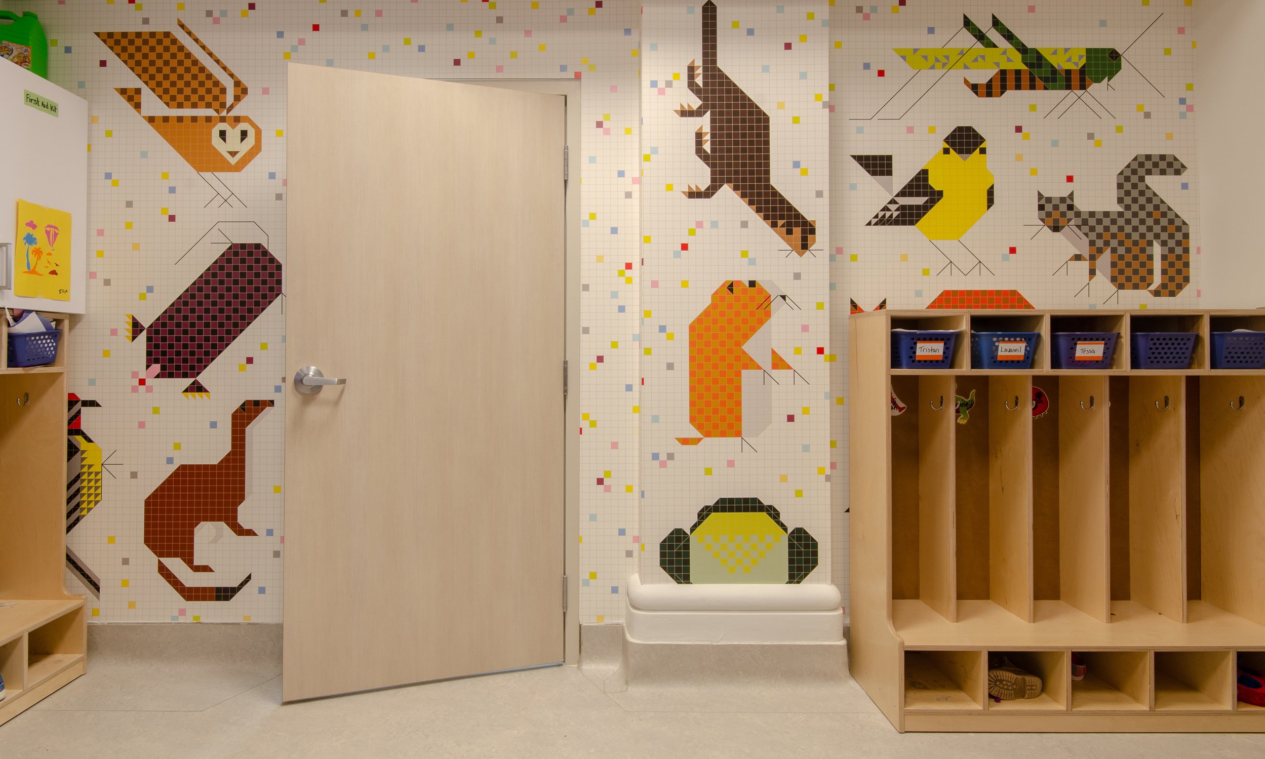 Kookum's Place Daycare featuring animal wallpaper and cubbies