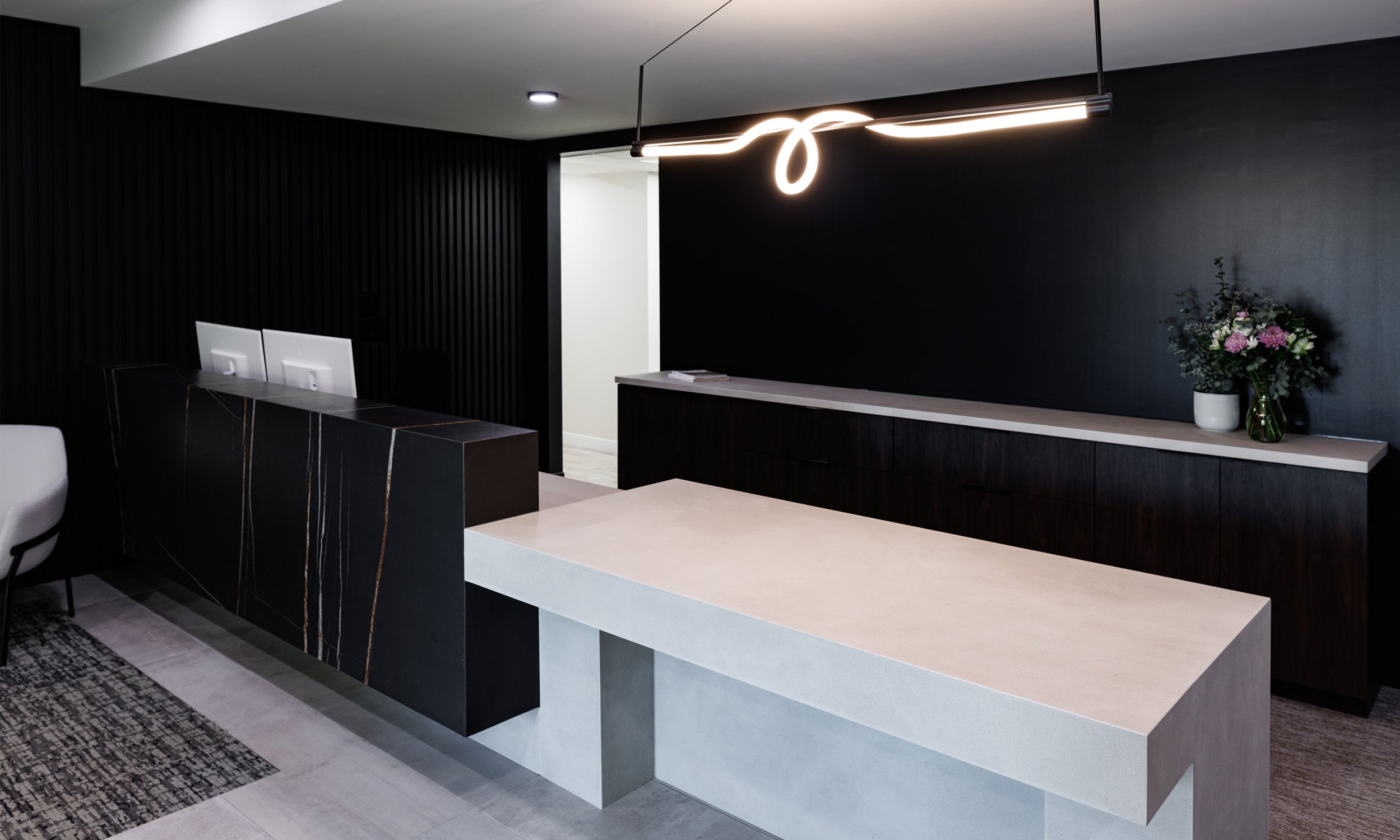 Sleek and modern office with marble reception desk